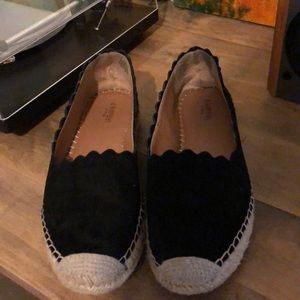 Crown Vintage scallop edged slip on sneaker.